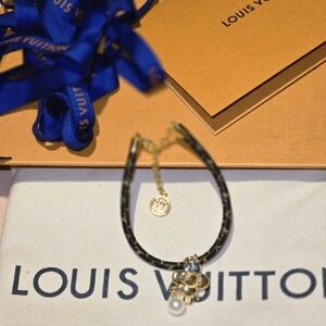 Louis Vuitton Black and Gold Charm Bracelet